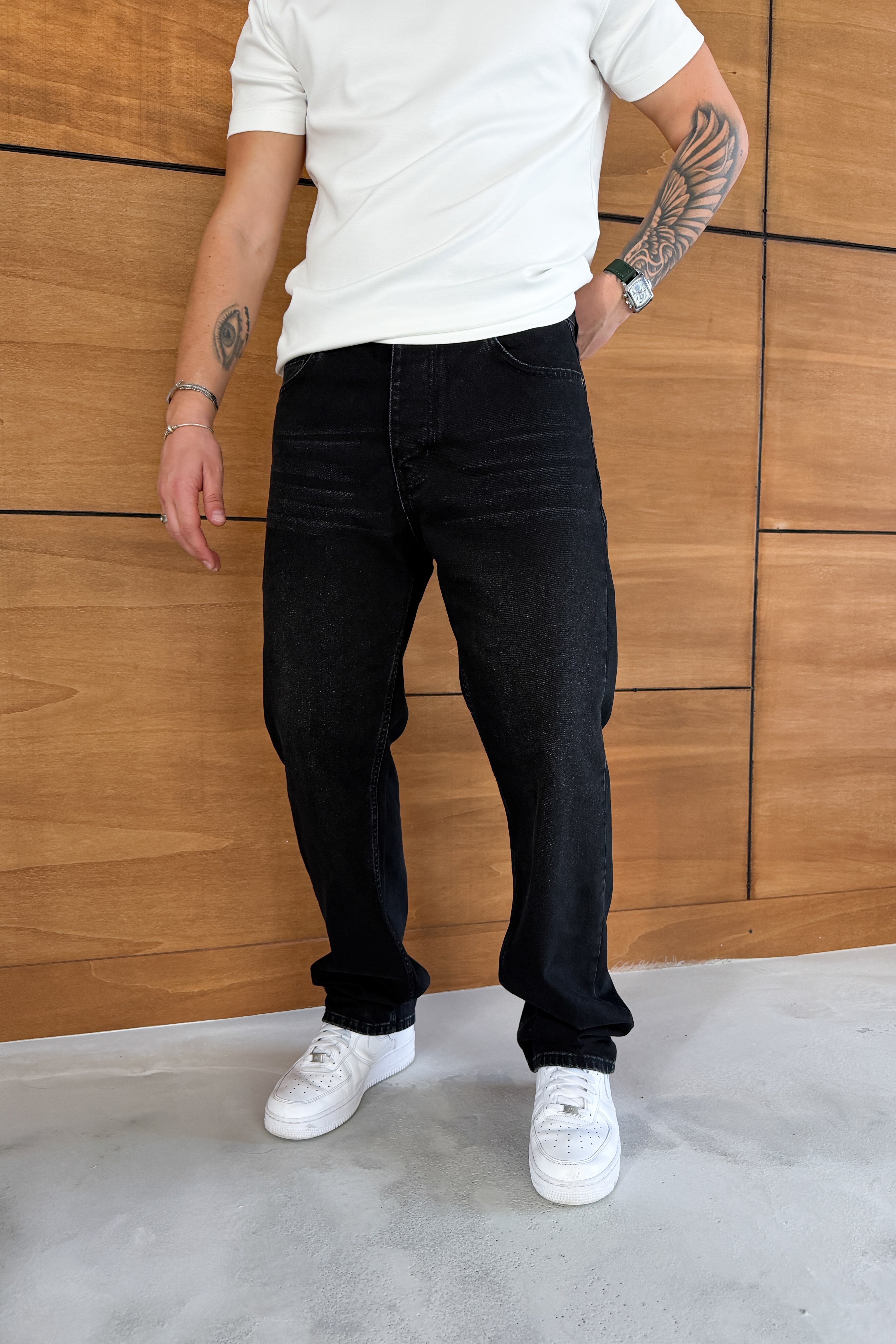 BAGGY FİT TAŞLANMIŞ KOT PANTOLON EFEKTLİ • SİYAH